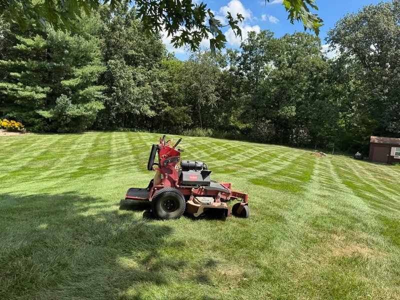 Lawn care service with American flag display